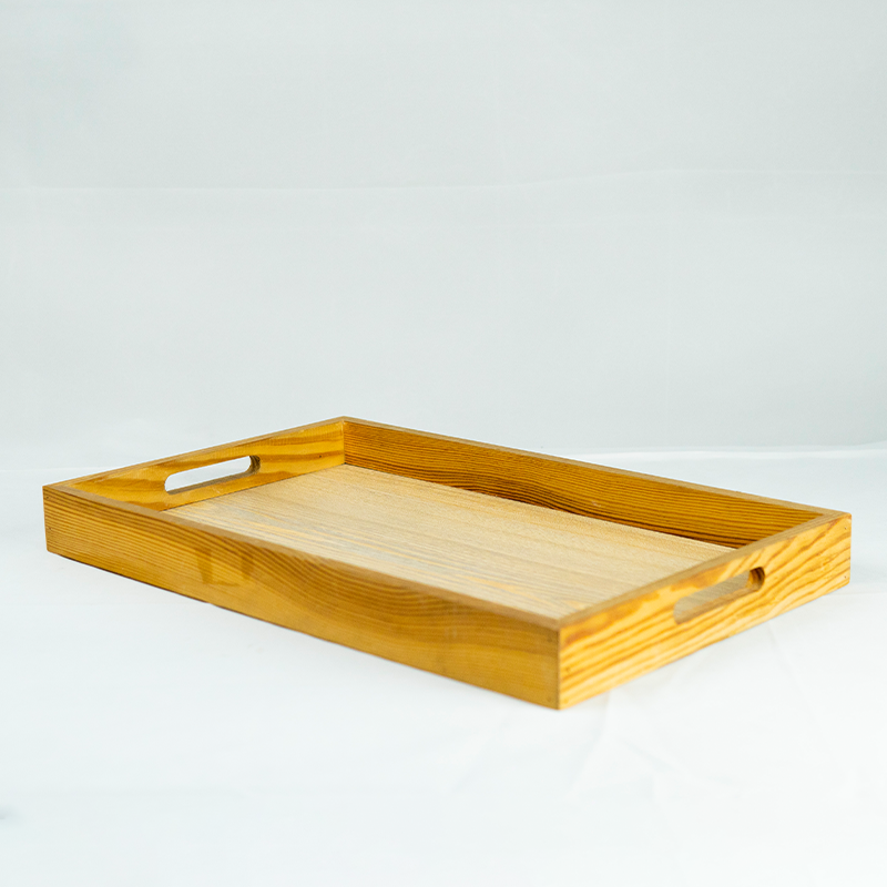 Wooden tray on a white background