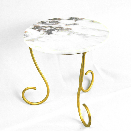 Small round table with marble top and gold metal legs on a white background
