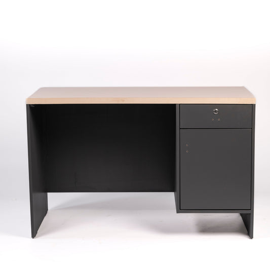 Black office desk with a beige top on a white background