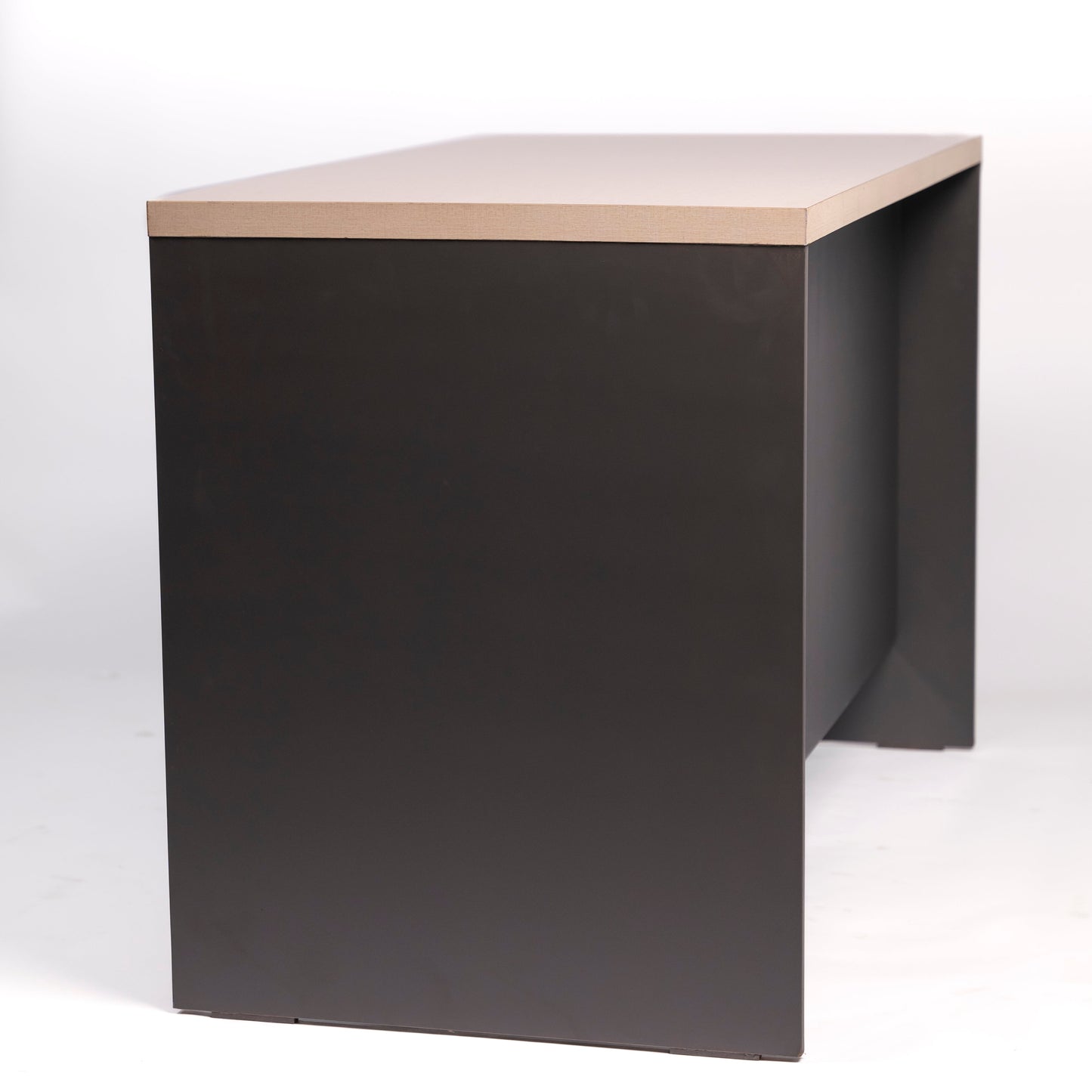 Black cube-shaped side table with a light wood top on a white background