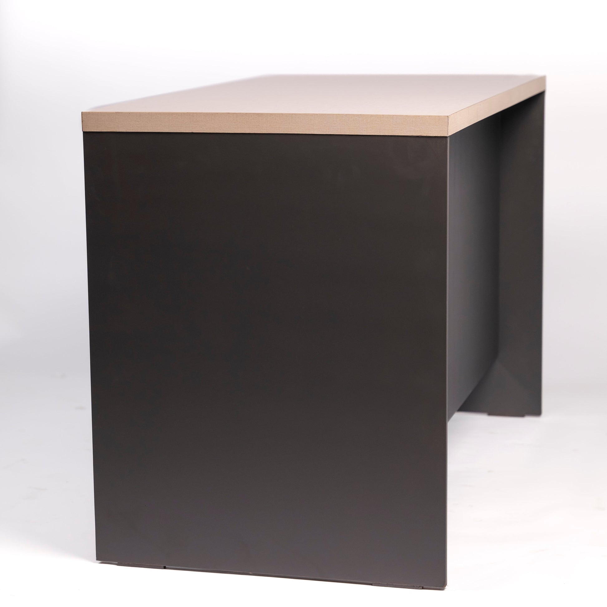 Black cube-shaped side table with a light wood top on a white background