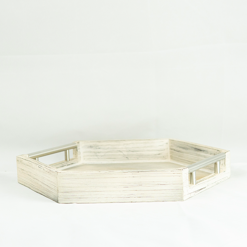 Hexagonal wooden tray on a white background