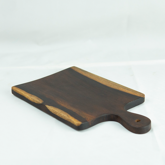 Wooden cutting board with a handle on a white background