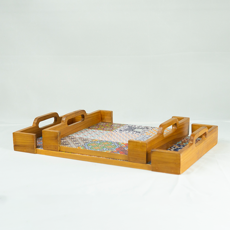 Wooden tray with handles on a white background