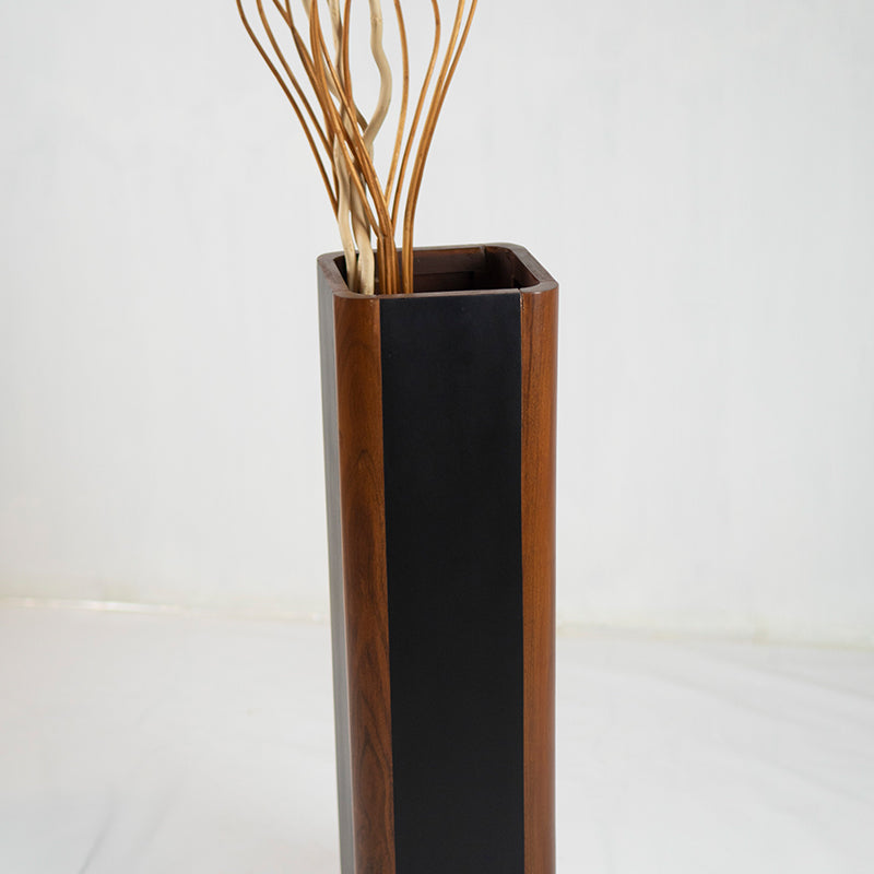 Tall rectangular pot with black front panel and wooden sides on a white background